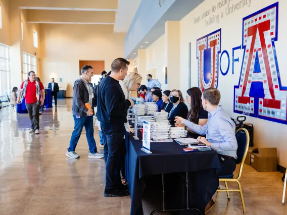 Attendees checking in at the registration tables of the Data Summit in the SUMC Diamond Atrium