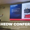 Text overlaid on a picture of Christopher Cherry presenting at HEDW. The text reads "2025 HEDW Conference, Georgia Institute of Technology, Atlanta GA, April 6-9, 2025.